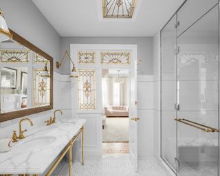 white/ golden themed bathroom