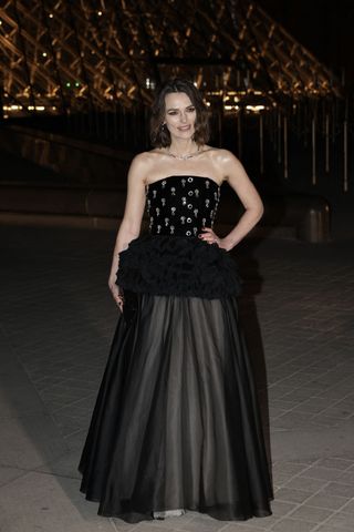 celebrity guests arrive at the inaugural grand diner du louvre in paris wearing designer fashion