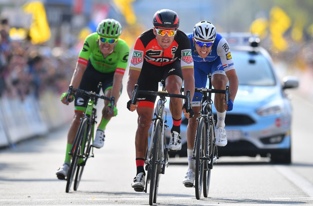 The trio of Dylan Van Baarle, Greg Van Avermaet and Niki Terpstra approach the line