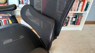 A detail shot of the lumbar support of the Sihoo C300 Pro chair.