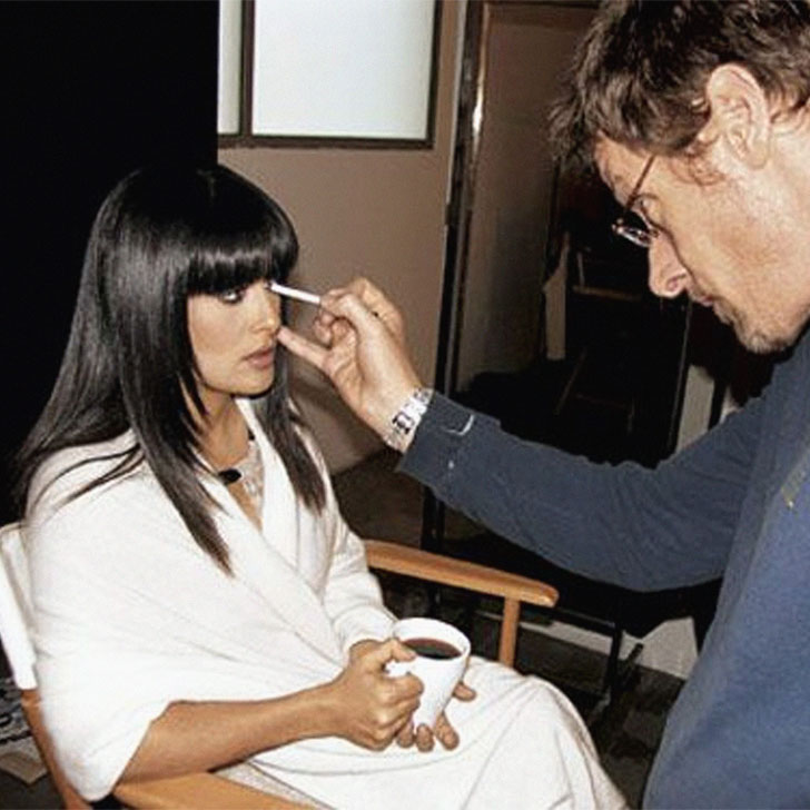 salma hayek getting makeup applied for photo shoot