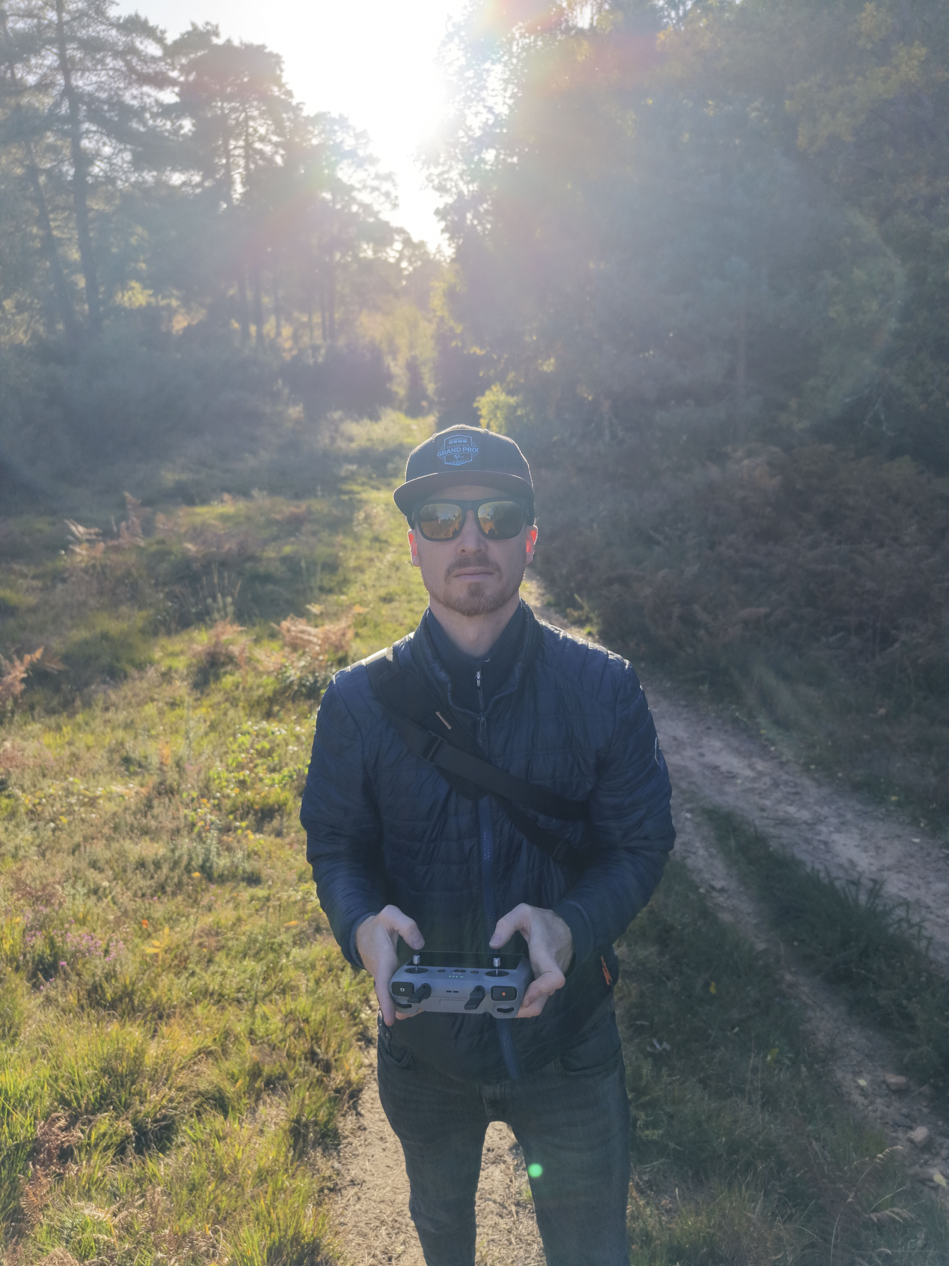 DJI Mini 5 Pro sample images: backlit pilot in heathland