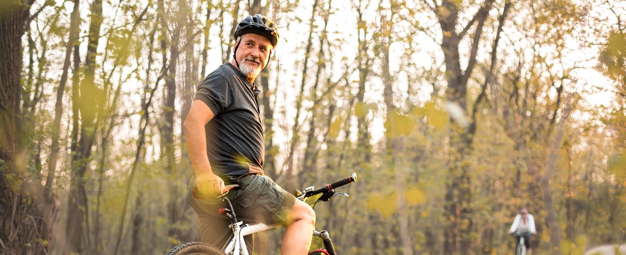 Retired man on a bike.