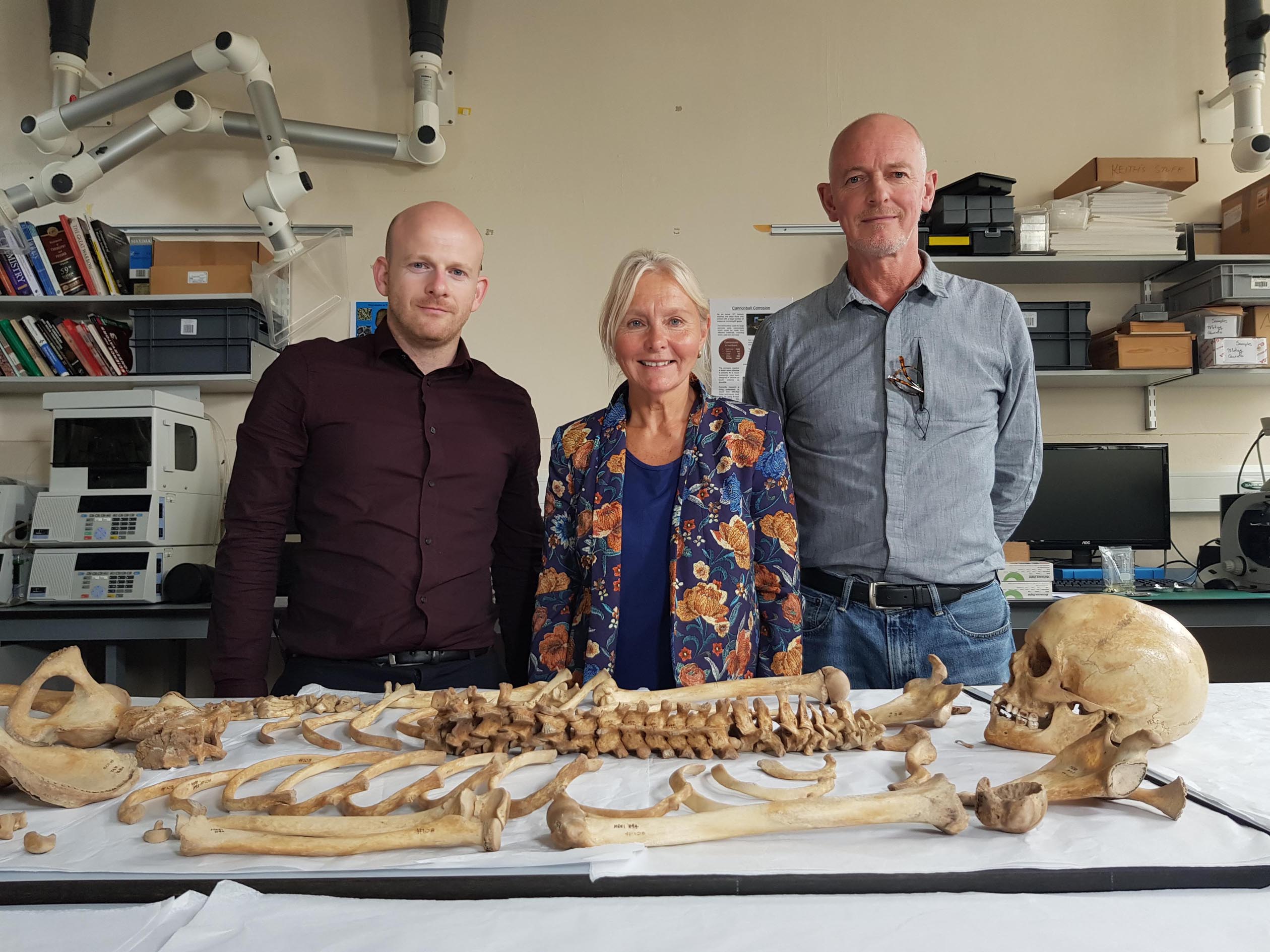 Skeletons of the Mary Rose: Dr Richard Madgwick, Alex Hildred and Nick Owen examining the skeleton from the Mary Rose