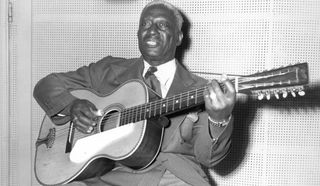 Lead Belly, pictured at a recording session in the 1940s