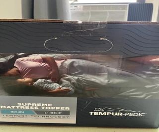 A close-up of a Tempur-Pedic delivery box.