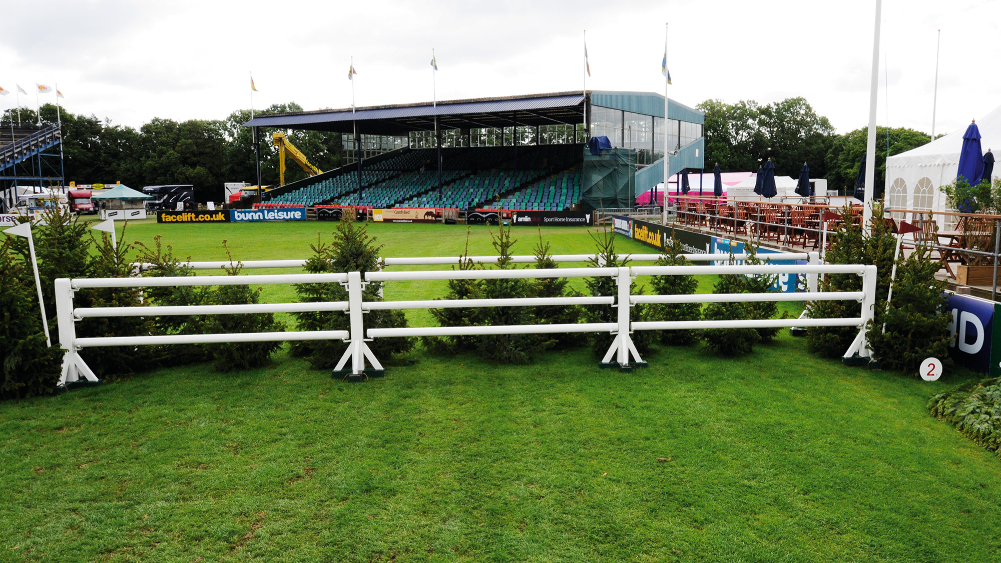 White oxer fence on Hickstead Derby course