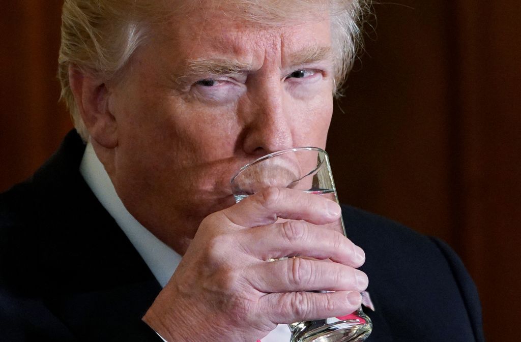 President Trump drinks water