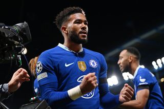 Chelsea star Reece James celebrates after scoring their sides third goal during the UEFA Champions League group E match between Chelsea FC and AC Milan at Stamford Bridge on October 05, 2022 in London, England.