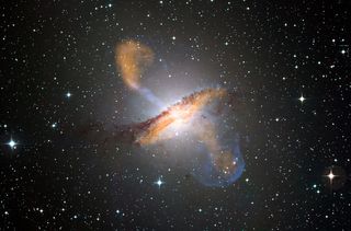 A composite image showing jets and radio-emitting lobes emanating from Centaurus A’s central black hole.
