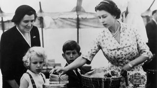 Queen Elizabeth with a young Princess Anne and Prince Charles