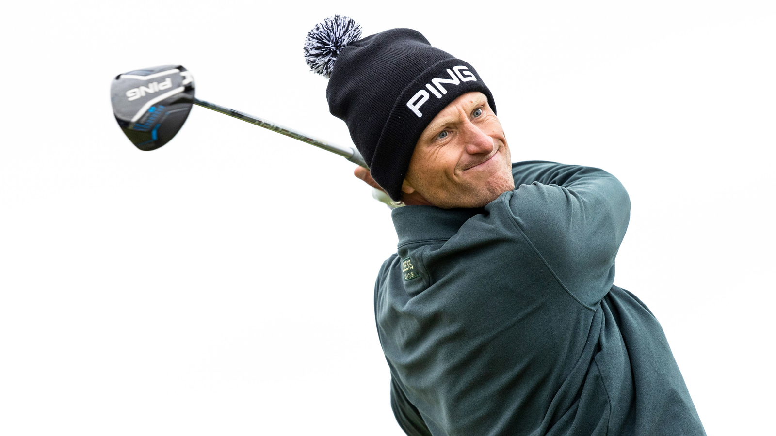 Adrian Meronk hits a driver off the tee