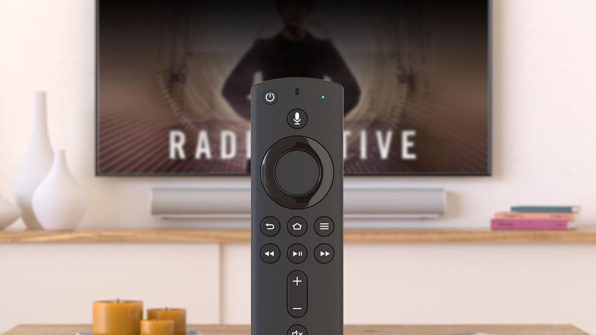 amazon fire tv remote in front of tv screen