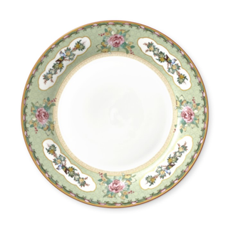 dinner plate with green floral motif around edge