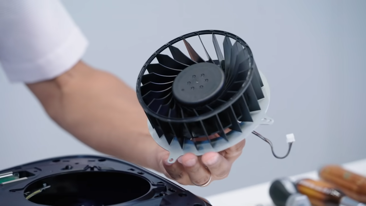 Removing PS5 cooling fan in order to clean PS5