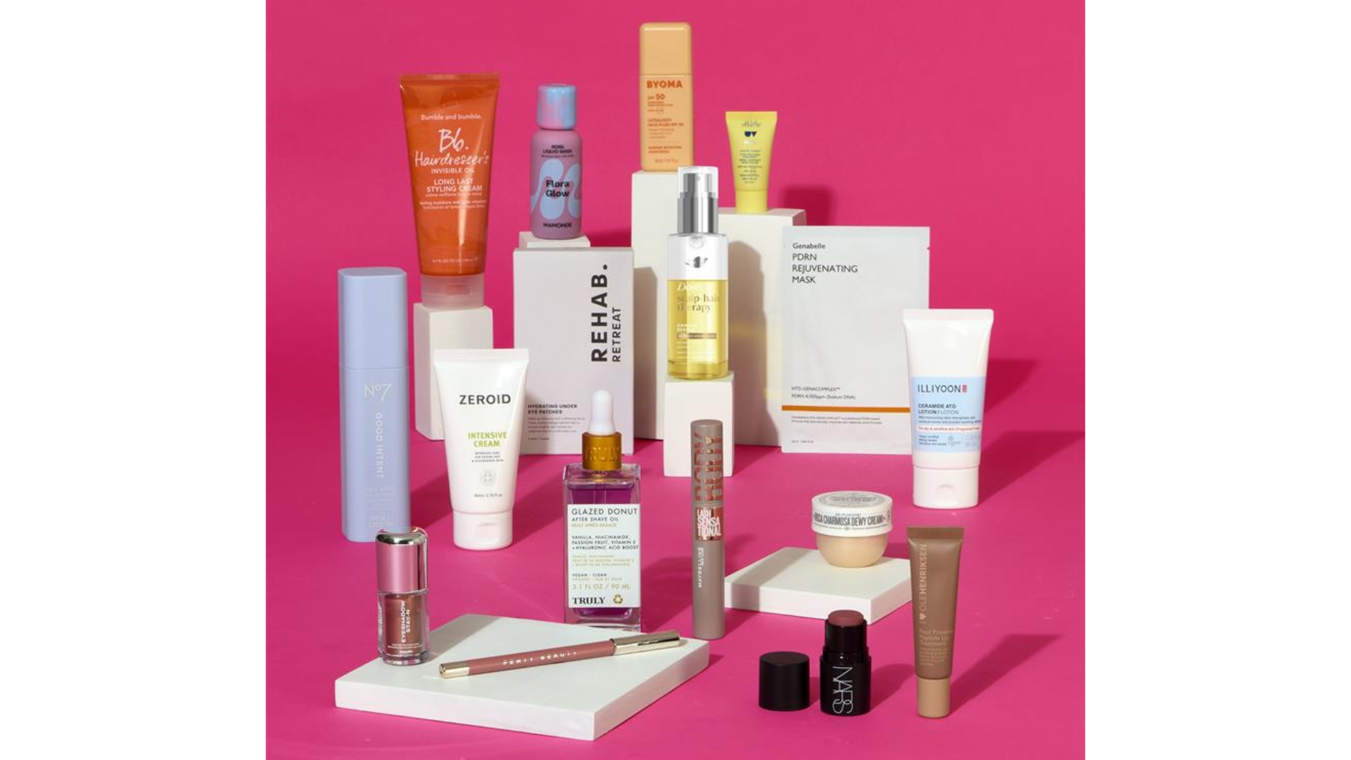 Image of the contents of the Boots New &amp;amp; Trending Beauty Box on a pink background
