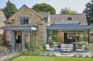 glass box orangery extension to traditional cottage