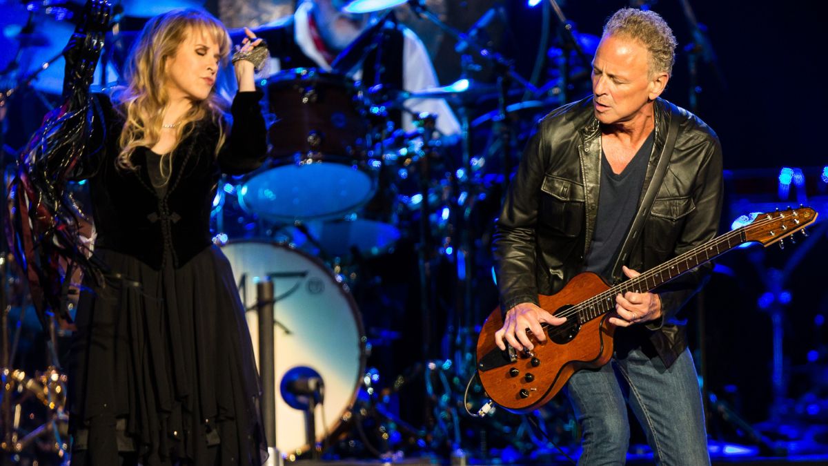 Vocalist Stevie Nicks (L) and vocalist/guitarist Lindsey Buckingham of Fleetwood Mac perform at Staples Center on July 3, 2013 in Los Angeles, California.