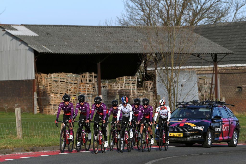 OUDENAARDE BELGIUM FEBRUARY 23 Ashleigh Moolman Pasio of South Africa Elena Cecchini of Italy Roxane Fournier of France Demi Vollering of The Netherlands Nikola Noskova of Czech Republic Niamh FisherBlack of New Zealand Anna Van Der Breggen of The Netherlands Jolien Dhoore of Belgium Chantal van den BroekBlaak of The Netherlands KarolAnn Canuel of Canada Christine Majerus of Luxembourg Amy Pieters of The Netherlands and Lonneke Uneken of The Netherlands and Team SD Worx during the Team SDWorx 16th Omloop Het Nieuwsblad 2021 Training Team Presentation Car teamsdworx OmloopHNB OHN21 on February 23 2021 in Oudenaarde Belgium Photo by Luc ClaessenGetty Images