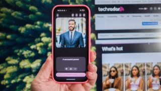 Pixel 9a in Peony pink showing Pixel Studio with the prompt "A successful person" and an image of a young white man in a business suit