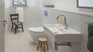 downstairs toilet ideas - narrow downstairs bathroom with grey and white tiles