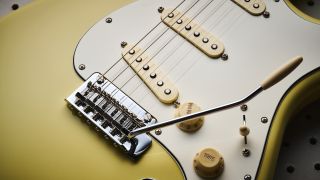 The pickups and tremolo on a Fender Player II Strat