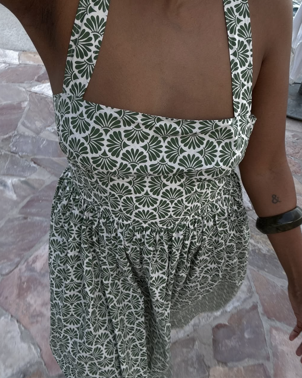 woman wearing patterned dress