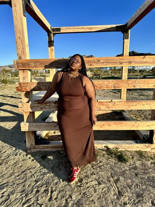 chichi wears brown set and poses in joshua tree california