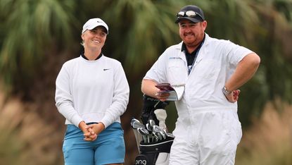 Maja Stark of Sweden laughs with her caddie, Hadley Trenfield, on the second hole during the first round of the CME Group Tour Championship at Tiburon Golf Club
