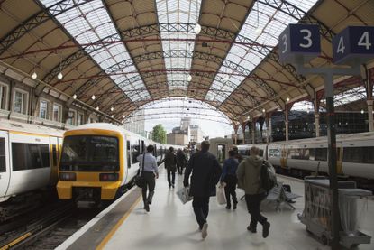 A crowd on a train station platform