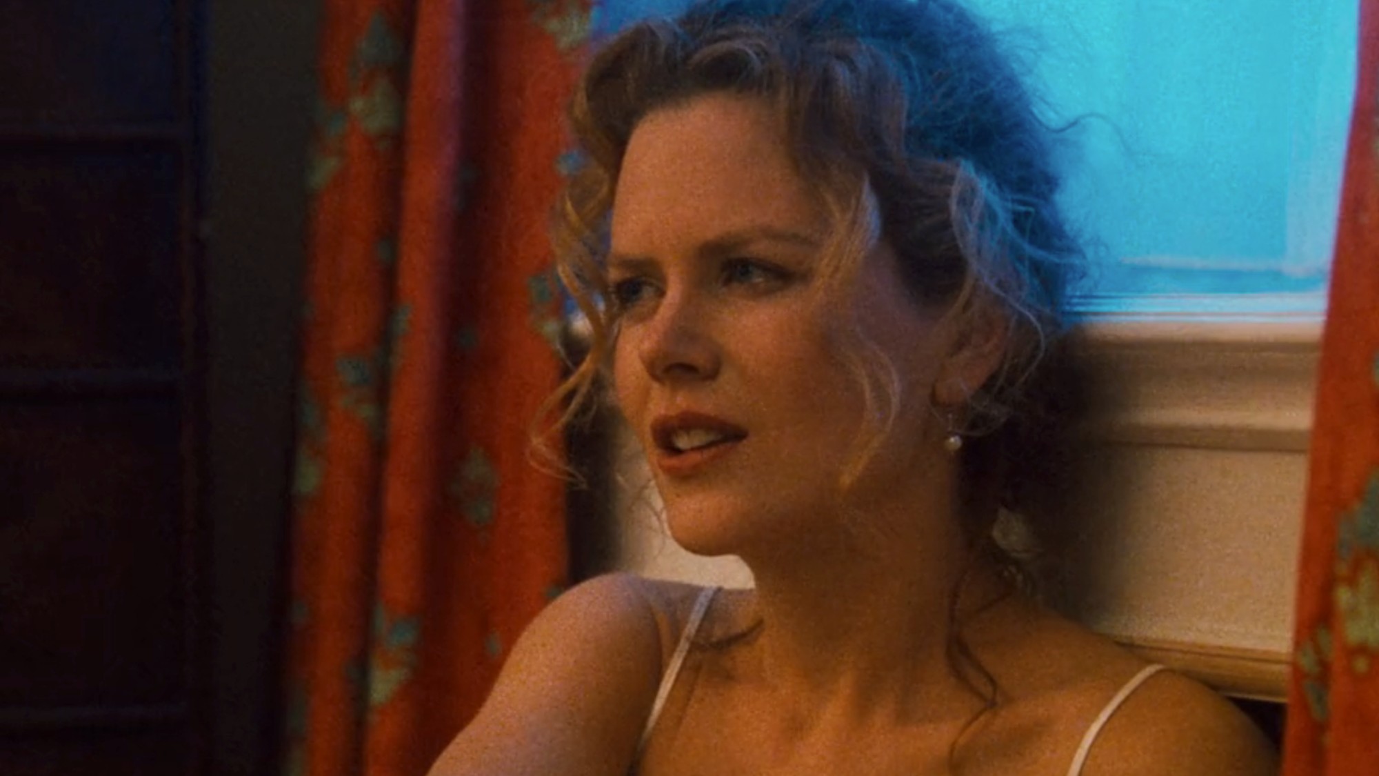 A close up of Nicole Kidman looking upset in Eyes Wide Shut