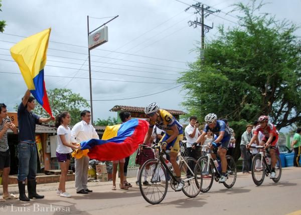 Fans proudly wave the flag of Colombia during their national tour