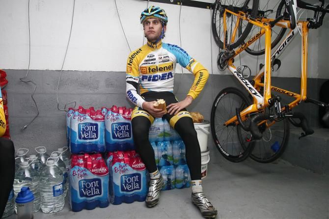 Jens Vandekinderen, a U23 rider for Telenet-Fidea, munches on a sandwich at the team's Mallorca training camp