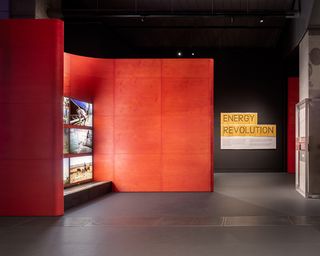 red wall in Science Museum Energy Revolution gallery by Unknown Works
