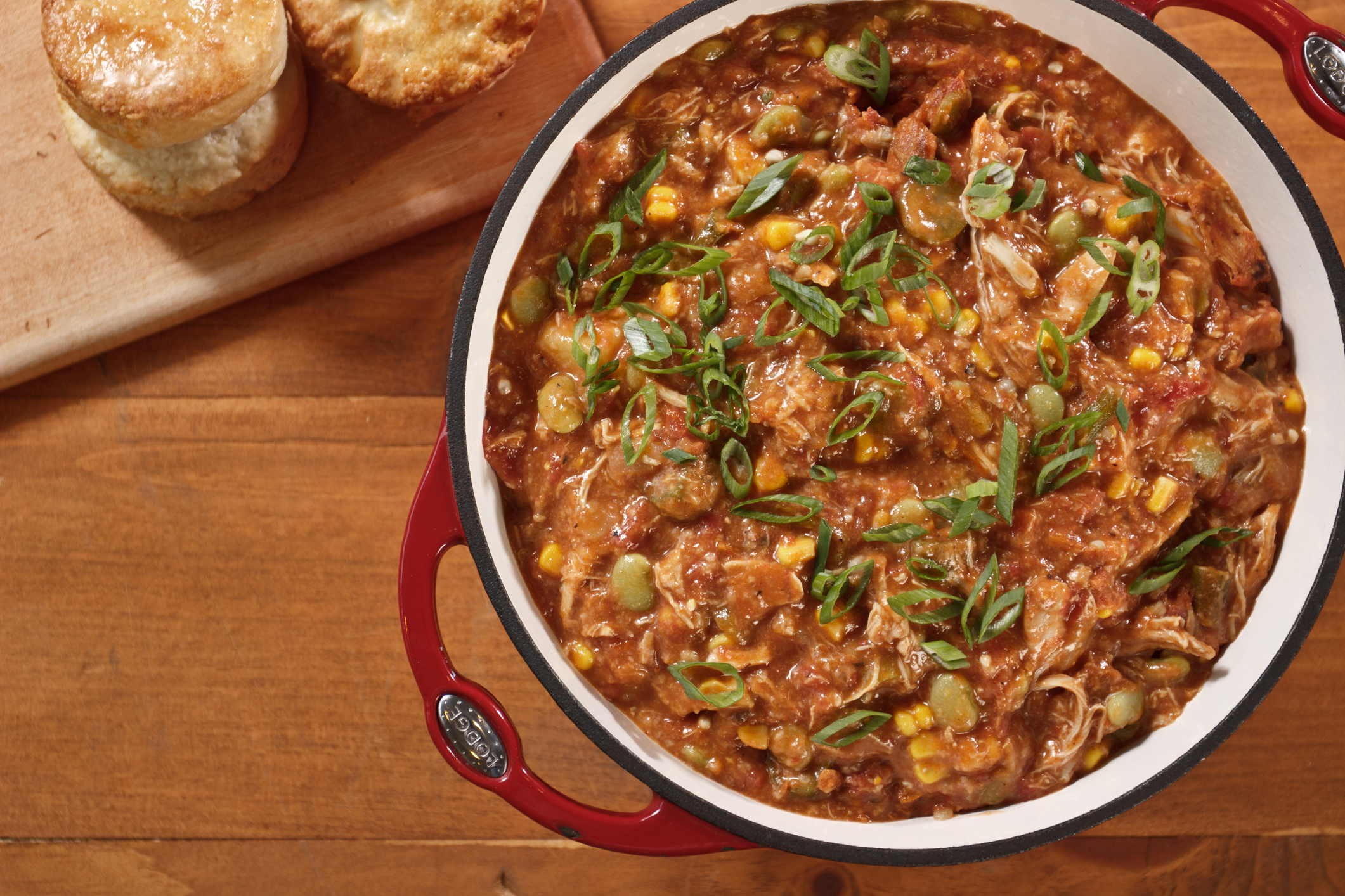 Brunswick stew pot with a side of cornbread muffins