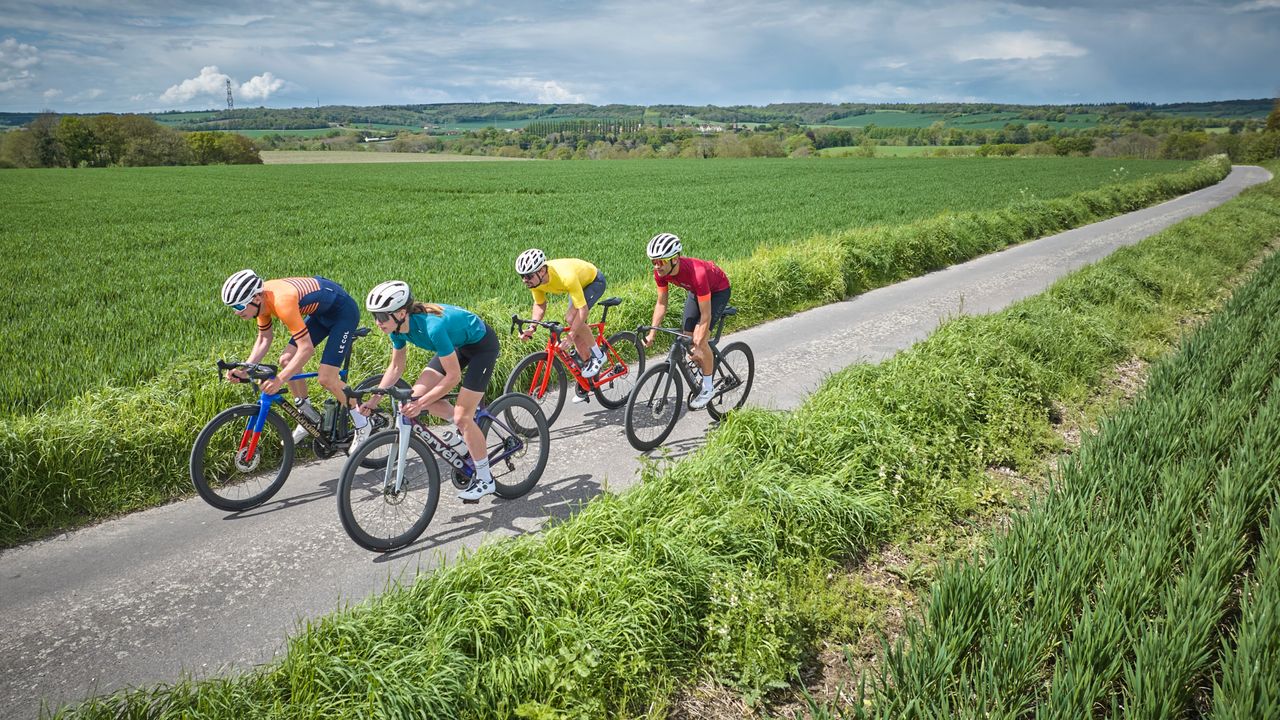 A group of cyclists riding a selection of the best road bikes