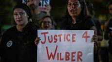 People protest outside the Texas State Capitol in Austin, Texas, after a Venezuelan national was shot and wounded during a US Immigration and Customs Enforcement (ICE) operation.