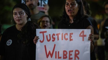 People protest outside the Texas State Capitol in Austin, Texas, after a Venezuelan national was shot and wounded during a US Immigration and Customs Enforcement (ICE) operation.