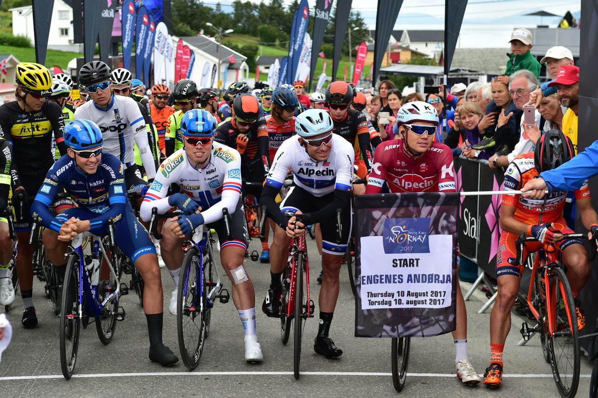 The riders assemble on the start line for stage 1