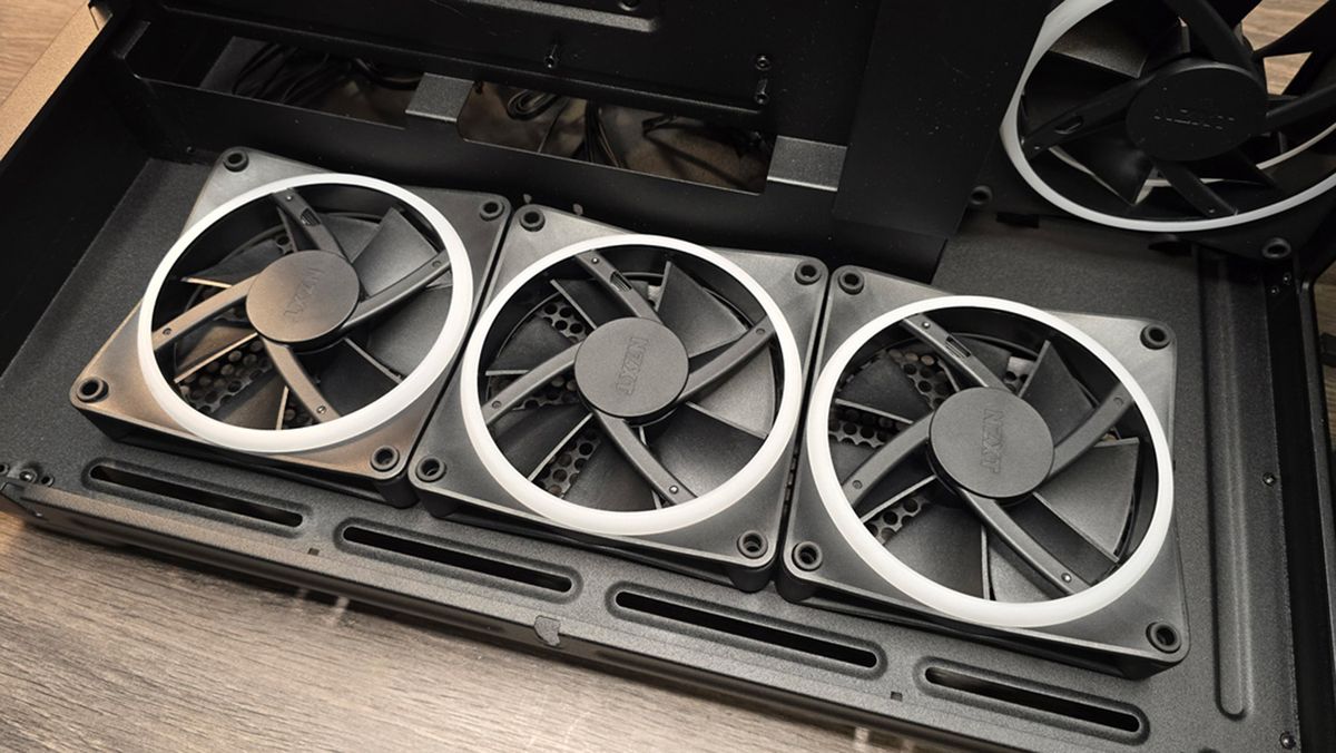 Various steps to building a gaming PC, including installing a liquid cooler.