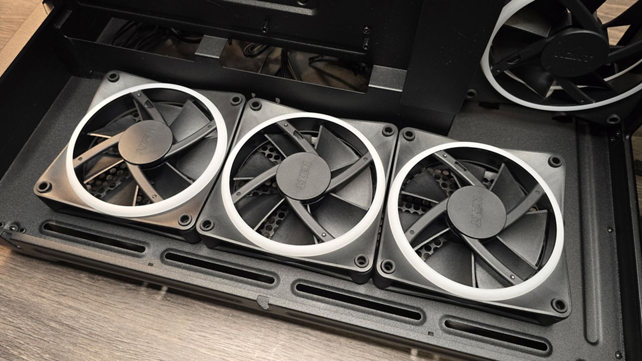 Various steps to building a gaming PC, including installing a liquid cooler.
