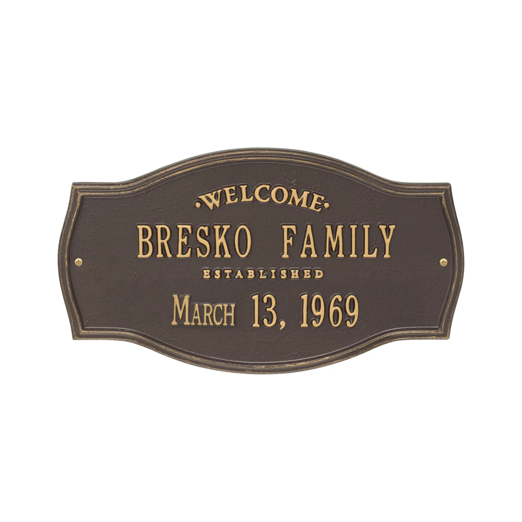 a brown welcome plaque 