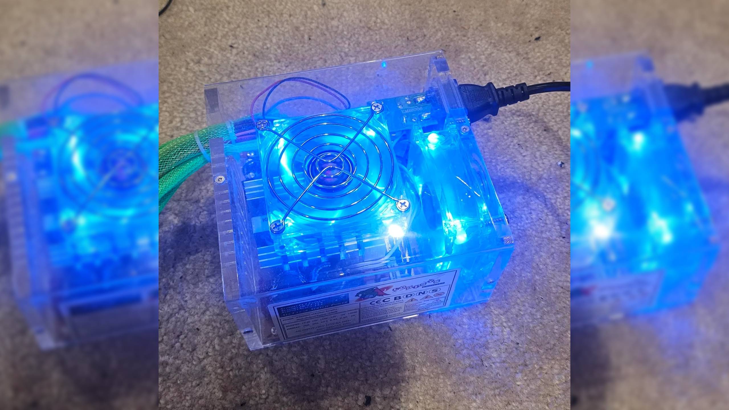aspie_electrician&#039;s Logisys PS550AC Clear Acrylic ATX 550W power supply lit up blue