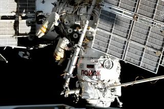 Russian cosmonauts Sergey Prokopyev and Dmitry Petelin are seen outside of the International Space Station's Poisk module during a spacewalk on June 22, 2023.