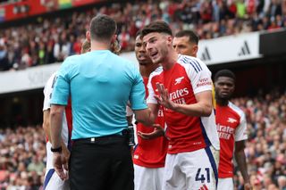 Declan Rice remonstrates with Chris Kavanagh during their clash with Brighton earlier this season