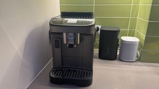 De'Longhi Magnifica Evo Next coffee machine on a kitchen counter top.