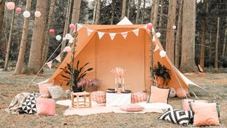 Garden party theme dressed for a festival with bell tent and bunting