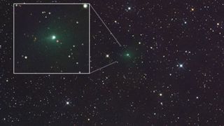 A glowing green light is seen in the center of a starry image from space but also in a white cutout box on the left part of the image