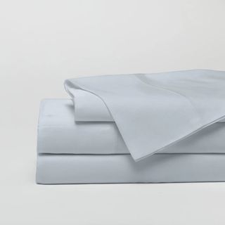 Cozy Earth Bamboo Sheet Set in Shore against a gray background.