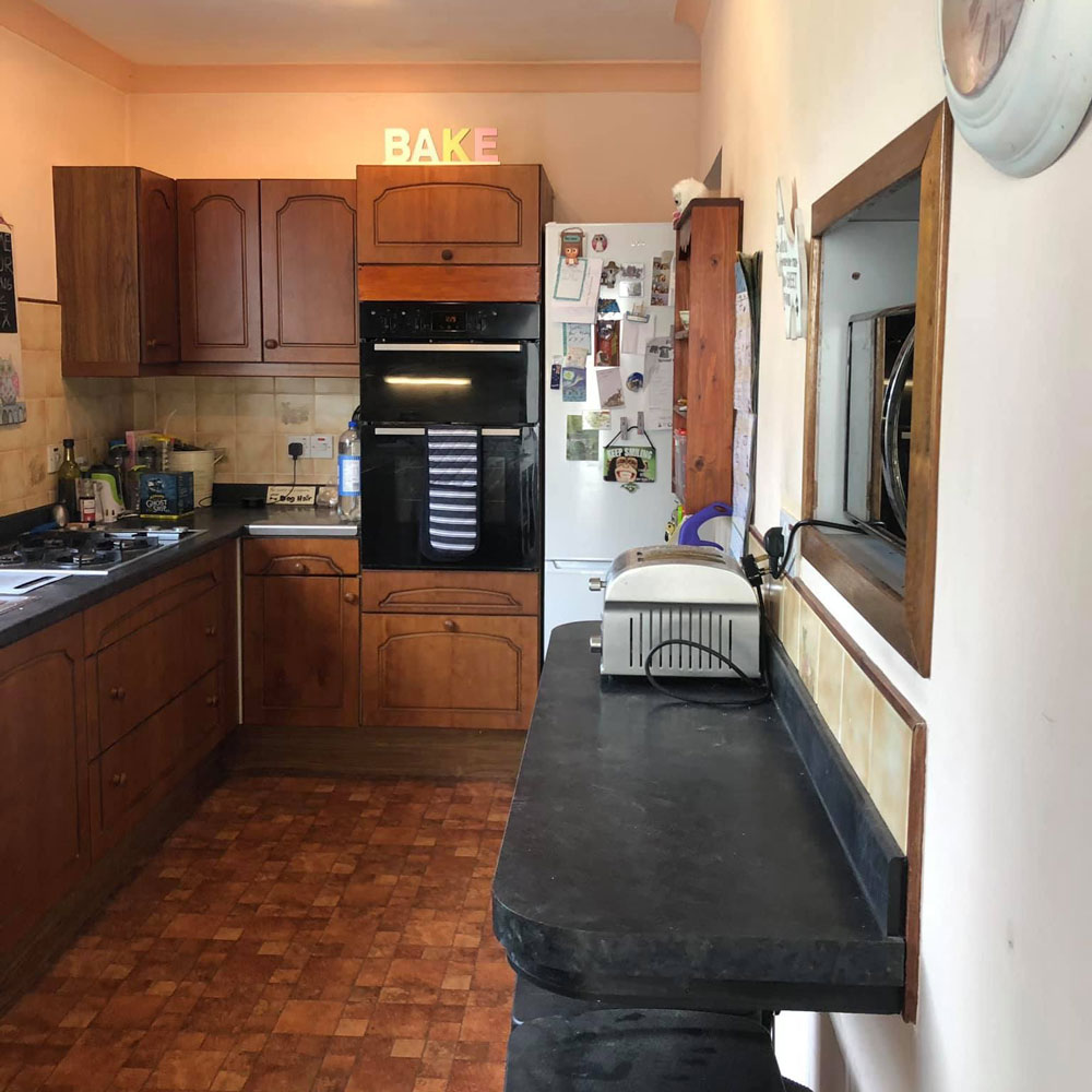 kitchen with wooden flooring and drawers